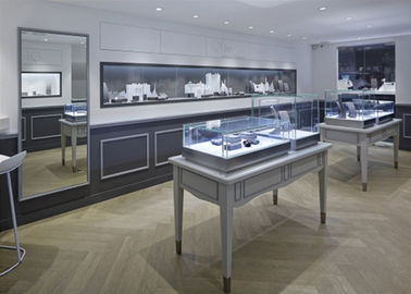 Bentuk melengkung Matte Gray Glass Perhiasan Display Cabinet Gaya Modern Sederhana