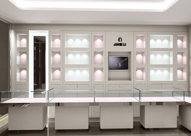 Lemari display perhiasan warna putih matte dengan dekorasi pencahayaan LED